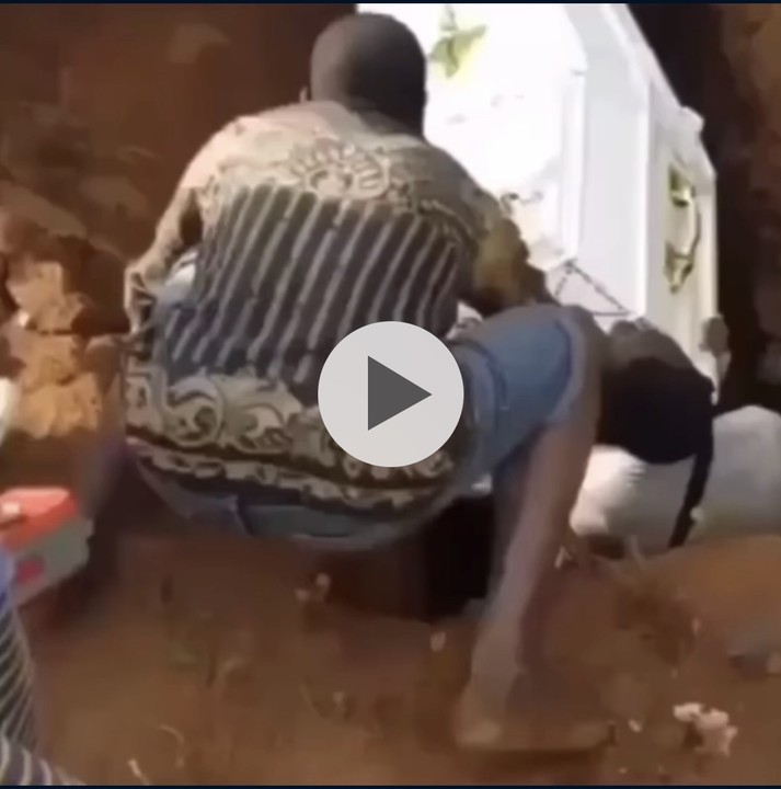 Man Falls Into Grave During Funeral