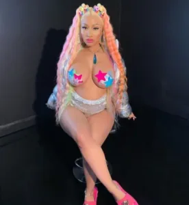 Profile 7 Nicki Minaj puts her naked boobs on display as her new Trollz video trends at no 1 shortly after release scaled 1