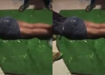 Man angrily Strips girlfriend Naked in public, canes her for cheating (Video)