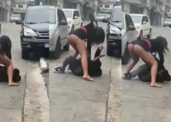 Lady goes nak€d while assaulting her boyfriend in public (Video)