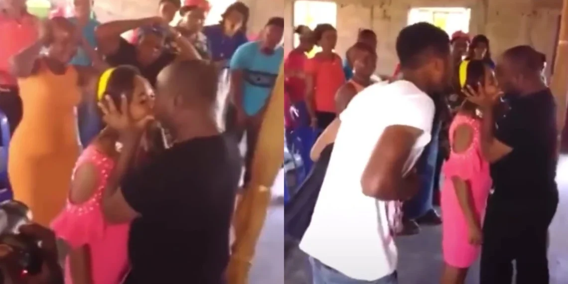 Pastor kisses a young woman in front of her husband & congregation (Video) 1 Pastor kisses a young woman in front of her husband & congregation (Video)