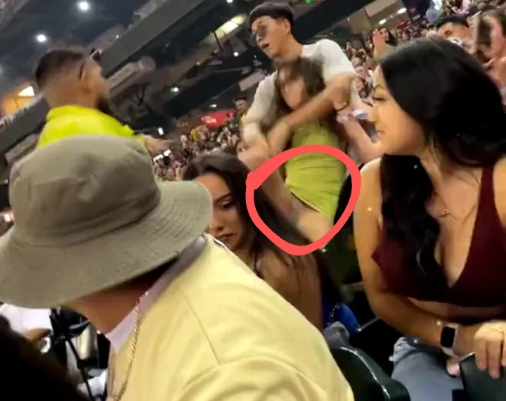 Lady exposes her underwear while defending her man in a stadium 1 Lady exposes her underwear while defending her man in a stadium