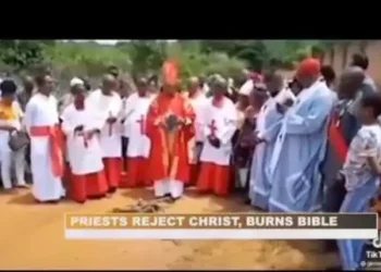 African priest rejects Christ, burns Holy Bible (video)