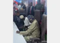 VIDEO: Tinubu Captured On Camera Sharing New Naira Note From A “Ghana Must Go Bag”