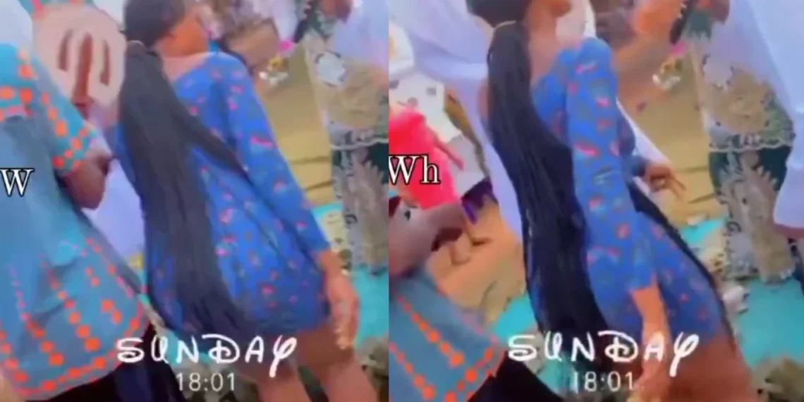 Lady pushes her ex boyfriend's bride to the ground on her marriage (video) 1 Lady pushes her ex boyfriend’s bride to the ground on her marriage (video)