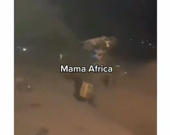 Shocking moment woman walks through a clan of hyenas unhurt (Watch video) 1 Shocking moment woman walks through a clan of hyenas unhurt (Watch video)