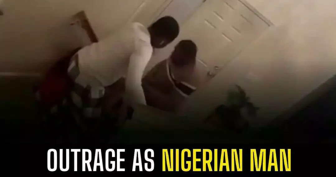 Outrage as Nigerian man a$$@ults his wife with a belt in the U.S (Video) 1 Outrage as Nigerian man a$$@ults his wife with a belt in the U.S (Video)