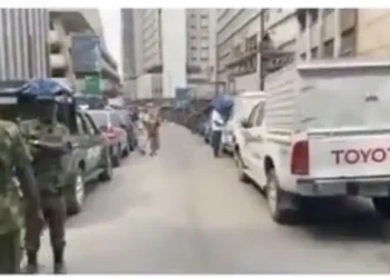Heavy military presence spotted at CBN, Lagos ahead of General Elections (video)
