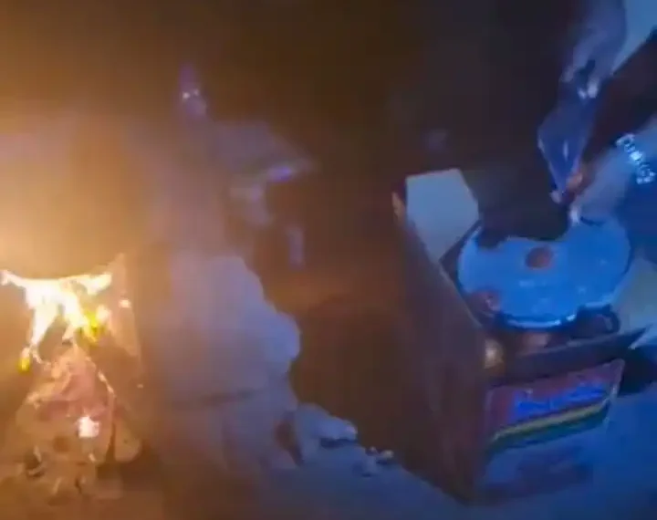 Watch moment voters cook for INEC officials late in the night (Video)
