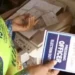 Police apprehends woman with over 550 laminated INEC materials (video) 10 Police apprehends woman with over 550 laminated INEC materials (video)