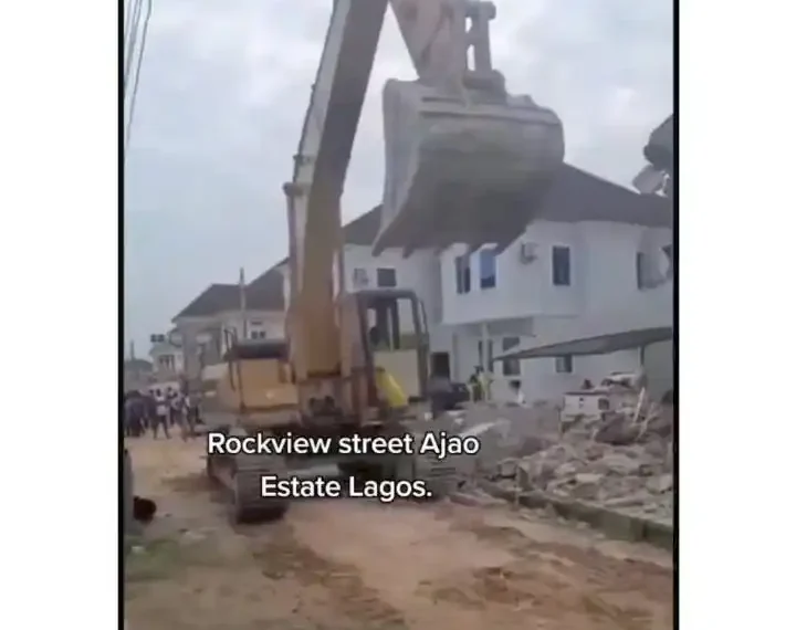 I could not bring out anything – Lady cries as she watch her house get demolished (Video)