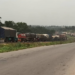 Truck drivers barricade Okigwe -Umuahia expressway over alleged shooting of driver 10 Truck drivers barricade Okigwe -Umuahia expressway over alleged shooting of driver