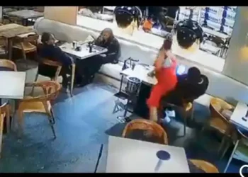 Drama as heavily pregnant woman attacks baby daddy and side chick in a restaurant (Video)