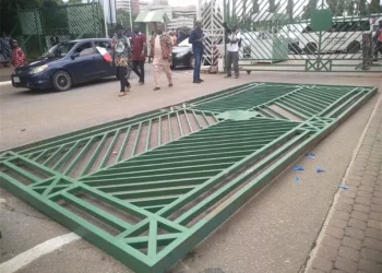 Protesters pull down National Assembly Gate in Abuja