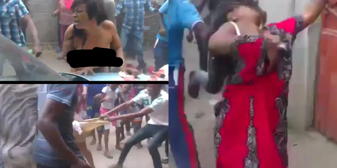 Angry Mob Assaults A Pregnant Teller For Setting Her Customers With Thugs (Video) 1 Angry Mob Assaults A Pregnant Teller For Setting Her Customers With Thugs (Video)