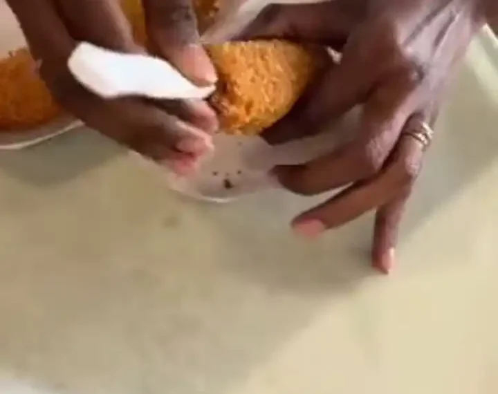 Cute or nasty? Lady inserts pregnancy test stick in her man's food to announce she's pregnant (Video) 1 Cute or nasty? Lady inserts pregnancy test stick in her man’s food to announce she’s pregnant (Video)