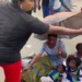 Drama as passer-by rakes at able-bodied woman for using children to beg in Rivers State (Video)