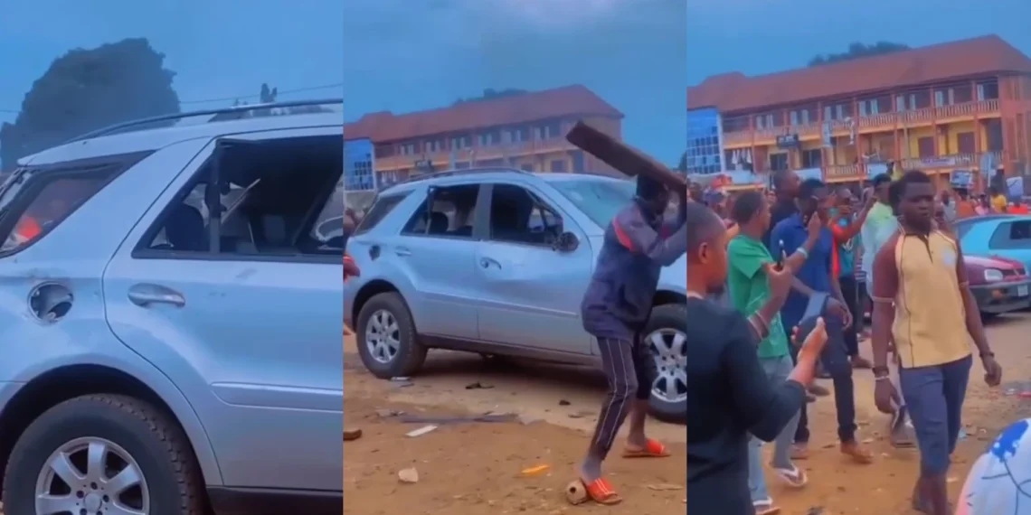 Angry Mob Destroy A Man's Car After He Ran Away With A Guy's Preeq (Video) 1 Angry Mob Destroy A Man’s Car After He Ran Away With A Guy’s Preeq (Video)