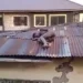 Confusion As Residents Spots A ‘Witch’ Sleeping On A Roof In Benin [VIDEO]