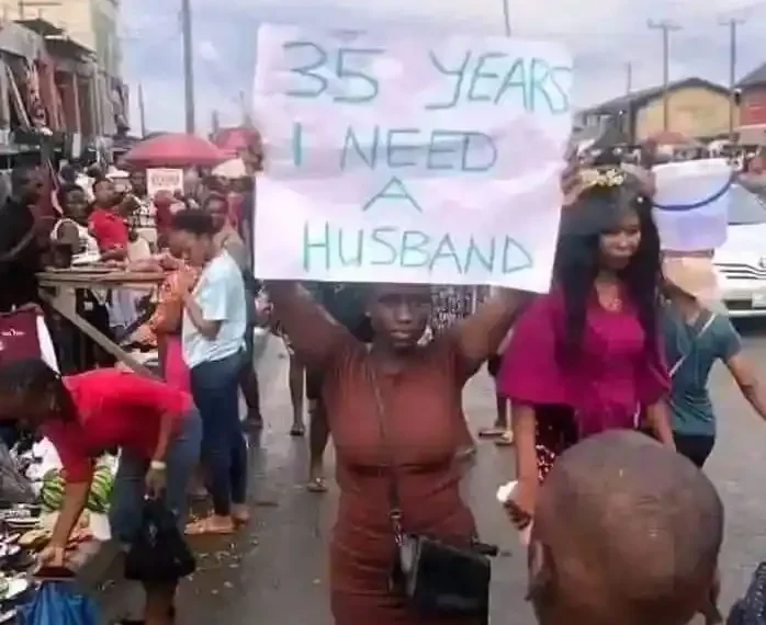 I Need a Husband: 35-year-old lady storms the street with placard 1 I Need a Husband: 35-year-old lady storms the street with placard