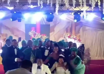 Can you do this on your wedding day? Moment groom joins guests to admit wife is smarter than him (video)