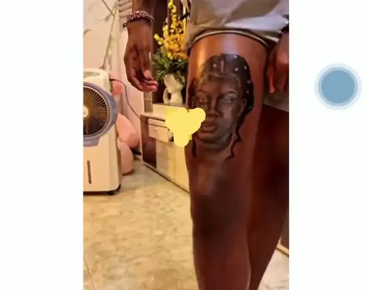 Man Tattoos Wife's Face On His Leg Ahead of Valentine (video) 1 Man Tattoos Wife’s Face On His Leg Ahead of Valentine (video)