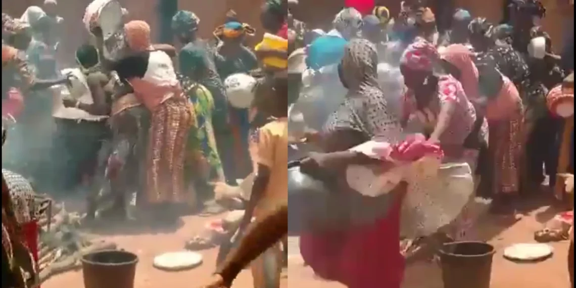 Hunger forces neighbors in Maiduguri to grab food vendor’s rice on fire [VIDEO]