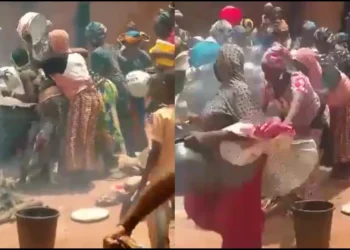 Hunger forces neighbors in Maiduguri to grab food vendor’s rice on fire [VIDEO]