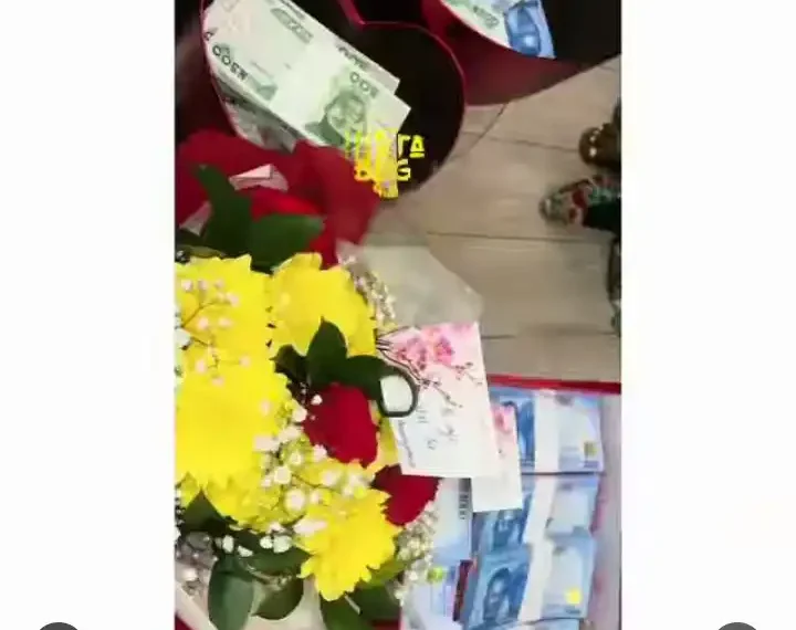 Man raises the bar as he uses bundle of cash to ask his girl to be his Valentine (Video)