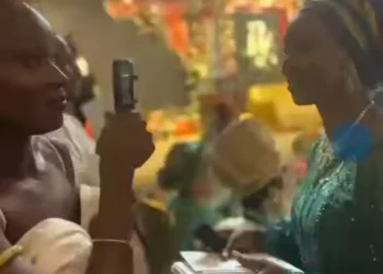 Nigerians React to Toyin Saraki’s Unique Money Spraying Style (Video)