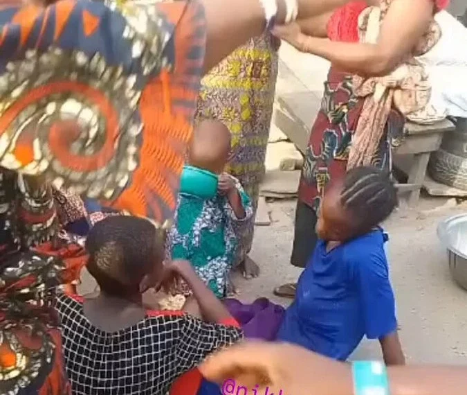 4 days without food - Yoruba widow faints with her child on her back 1 4 days without food – Yoruba widow faints with her child on her back