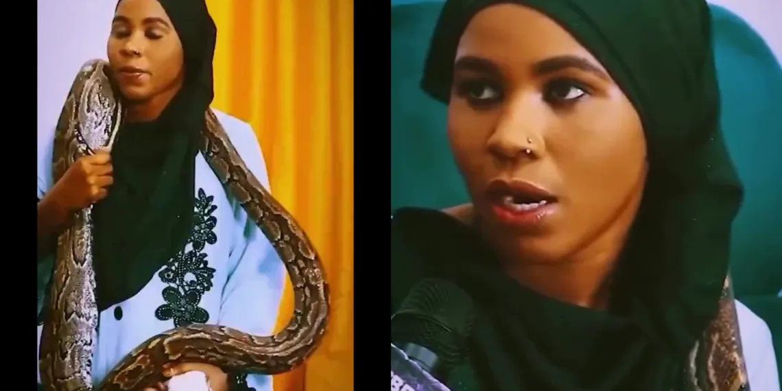 Latifah, a lady who sleeps with a big snake for money shares how she almost died of s£x 1 Latifah, a lady who sleeps with a big snake for money shares how she almost died of s£x
