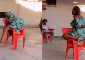 Trending video of a lady oozing electrifying vibes on top of a breakable chair