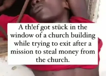 Suspected Thief gets stuck in the window of a church building while trying to escape theft (VIDEO)
